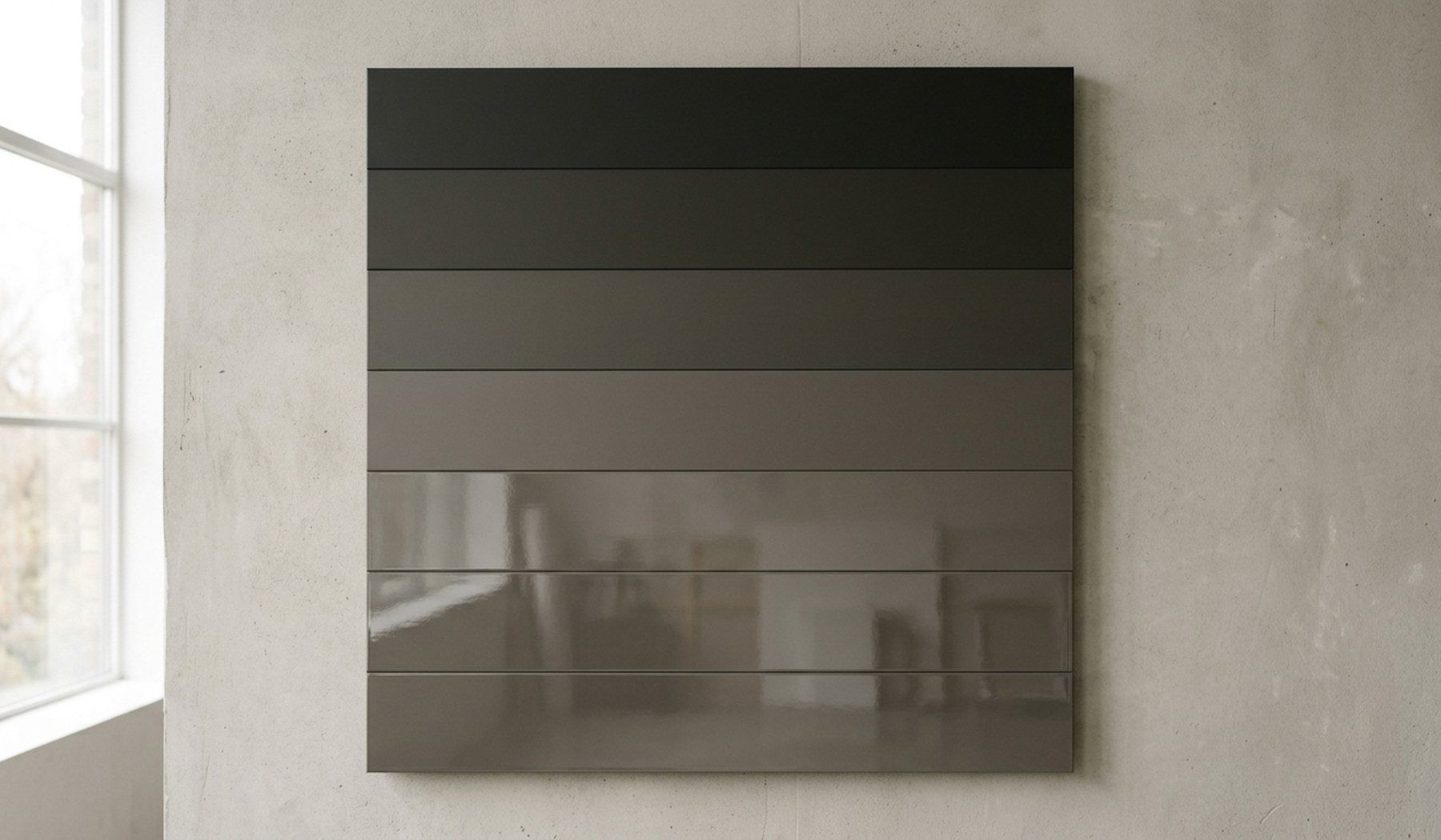 Bands of the same grey paint in sheens running from dead matte to high gloss